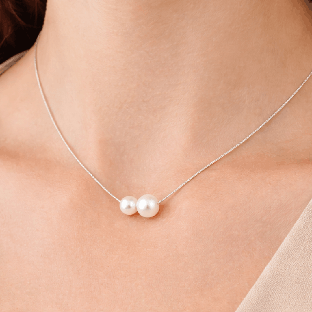 Ogrlica s bisernim perlama – srebrni lančić minimalističkog dizajna