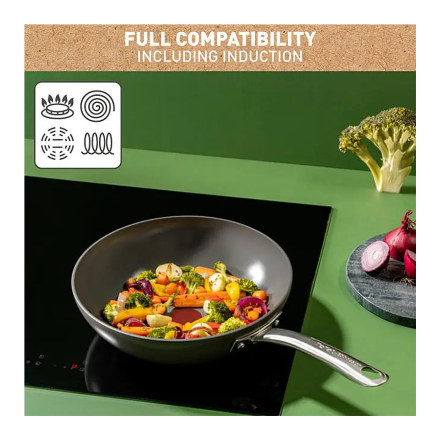 Omega Tefal C4241943 wok tava s non-stick premazom, prikazana na slici za kuhanje i prženje jela.
