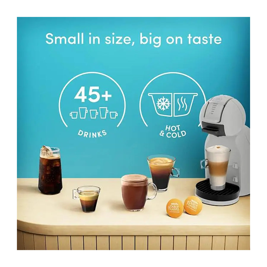Omega Krups Dolce Gusto Mini Me 2 aparat za kavu na kapsule, crne boje, s prikazom i gumbima za pripremu kave.