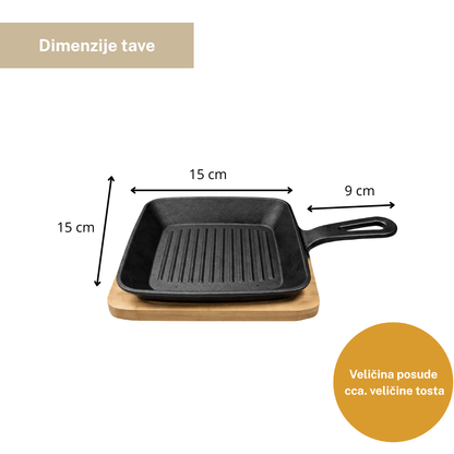Manja tava od lijevanog željeza na drvenoj dasci 22x14cm