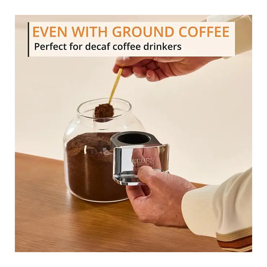 Omega Krups Coffee Crush SA401LE0 aparat za kavu s mljevenjem, prikazan na slici s crnim i srebrnim dizajnom.